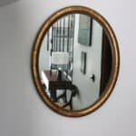 marius, le miroir ovale bois doré médaillon