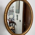 marius, le miroir ovale bois doré médaillon