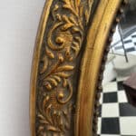 marius, le miroir ovale doré style napoléon iii