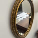 marius, le miroir ovale doré style napoléon iii