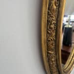 marius, le miroir ovale doré style napoléon iii