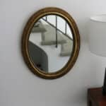 marius, le miroir ovale bois doré décoratif